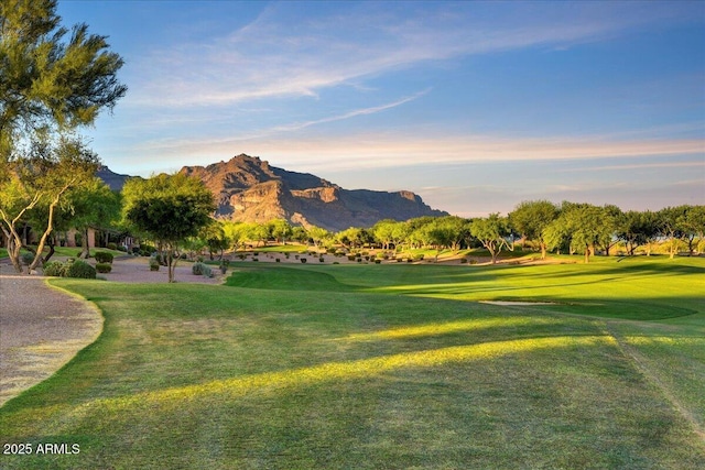 7710 E Golden Eagle Cir, Gold Canyon, AZ 85118 - view of home's community featuring golf course view, a mountain view, and a lawn