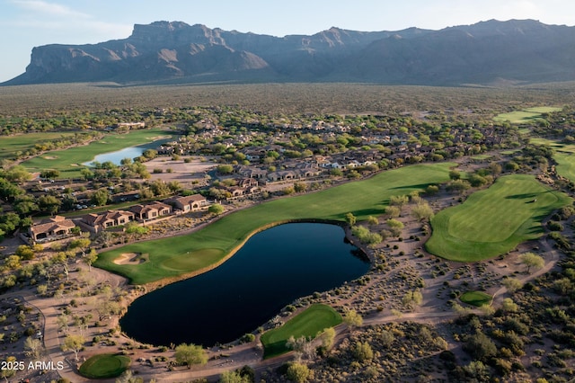 7710 E Golden Eagle Cir, Gold Canyon, AZ 85118 - aerial overview of property's location with a water and mountain view, nearby suburban area, and a local golf course