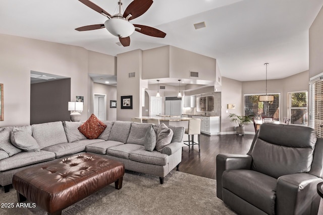 3733 E Kachina Dr, Phoenix, AZ 85044 - living area featuring ceiling fan, dark wood-style floors, and vaulted ceiling