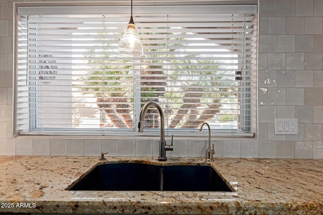 3733 E Kachina Dr, Phoenix, AZ 85044 - kitchen view of a sink, tasteful backsplash, and light stone countertops