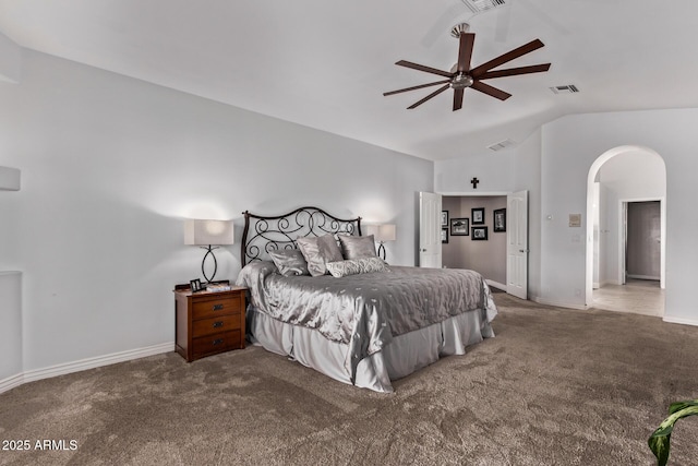 3733 E Kachina Dr, Phoenix, AZ 85044 - carpeted bedroom featuring lofted ceiling, arched walkways, baseboards, and a ceiling fan