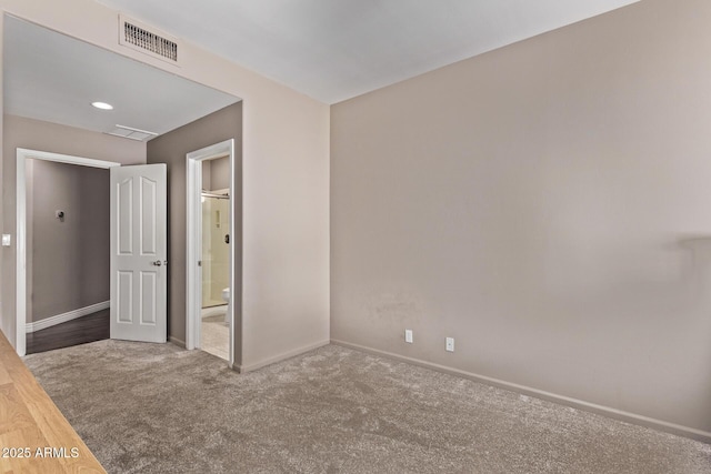 3733 E Kachina Dr, Phoenix, AZ 85044 - unfurnished bedroom featuring carpet, baseboards, and connected bathroom