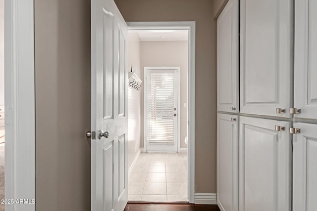 3733 E Kachina Dr, Phoenix, AZ 85044 - corridor with baseboards and tile patterned floors