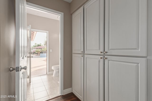 3733 E Kachina Dr, Phoenix, AZ 85044 - hall featuring baseboards and dark tile patterned floors