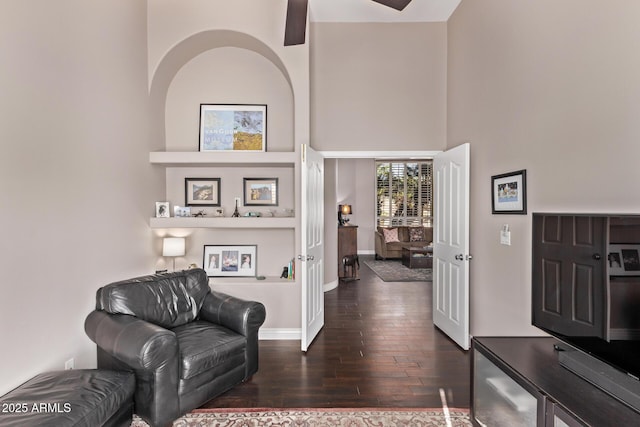 3733 E Kachina Dr, Phoenix, AZ 85044 - entrance foyer with wood finished floors, a towering ceiling, a ceiling fan, and baseboards