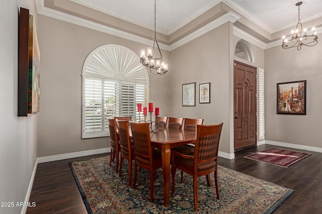 3733 E Kachina Dr, Phoenix, AZ 85044 - dining space featuring a chandelier, wood finished floors, and ornamental molding