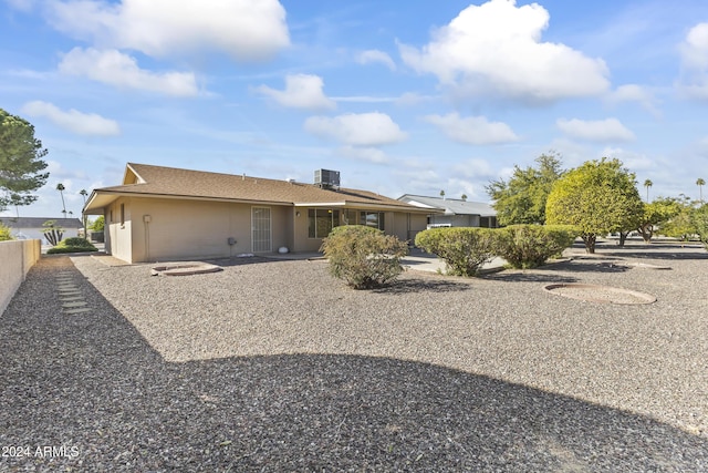 view of front of property with central AC unit