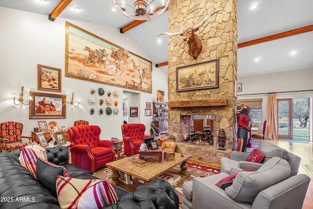 51238 N Pinal Ranch Rd, Miami, AZ 85539 - living area featuring beam ceiling, a fireplace, a chandelier, wood finished floors, and high vaulted ceiling