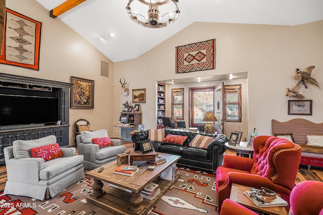 51238 N Pinal Ranch Rd, Miami, AZ 85539 - living area with high vaulted ceiling, beam ceiling, visible vents, and an inviting chandelier