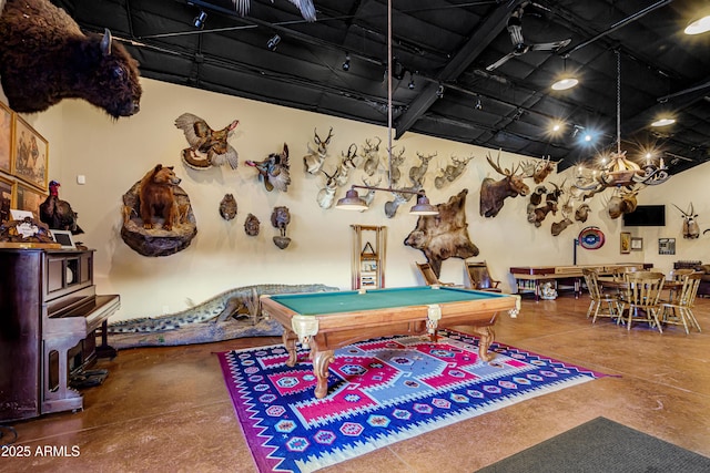 51238 N Pinal Ranch Rd, Miami, AZ 85539 - rec room with pool table and concrete floors