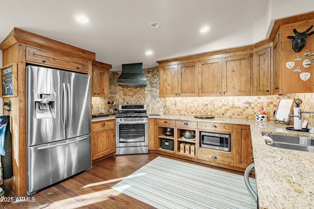 51238 N Pinal Ranch Rd, Miami, AZ 85539 - kitchen featuring dark wood-style flooring, backsplash, appliances with stainless steel finishes, a sink, and extractor fan