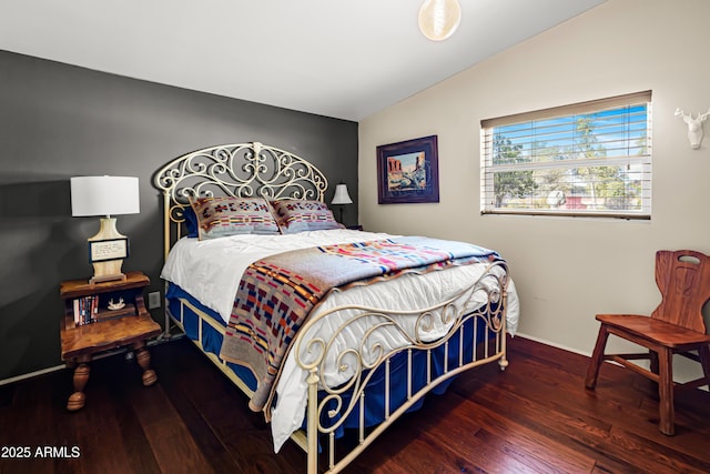 51238 N Pinal Ranch Rd, Miami, AZ 85539 - bedroom featuring baseboards, vaulted ceiling, and wood finished floors