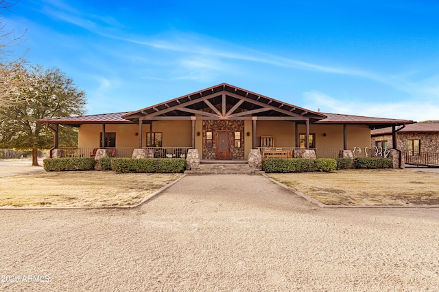 51238 N Pinal Ranch Rd, Miami, AZ 85539 - view of front facade with a porch, a standing seam roof, metal roof, and stucco siding