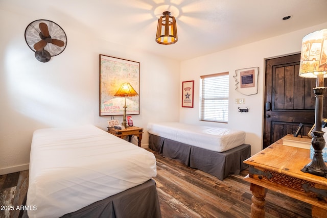 51238 N Pinal Ranch Rd, Miami, AZ 85539 - bedroom featuring baseboards and wood finished floors