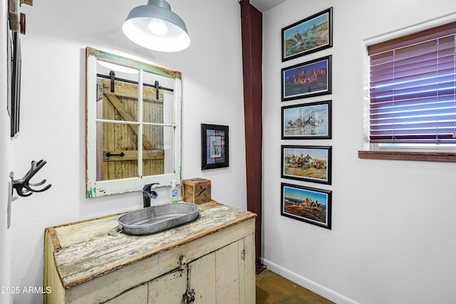 51238 N Pinal Ranch Rd, Miami, AZ 85539 - bathroom with baseboards and vanity