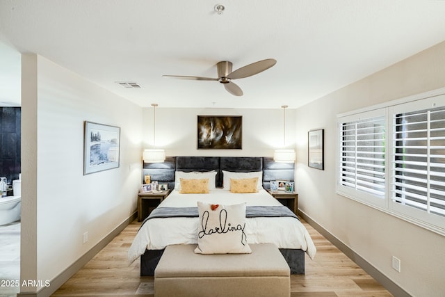 bedroom with visible vents, baseboards, a ceiling fan, and light wood-style floors