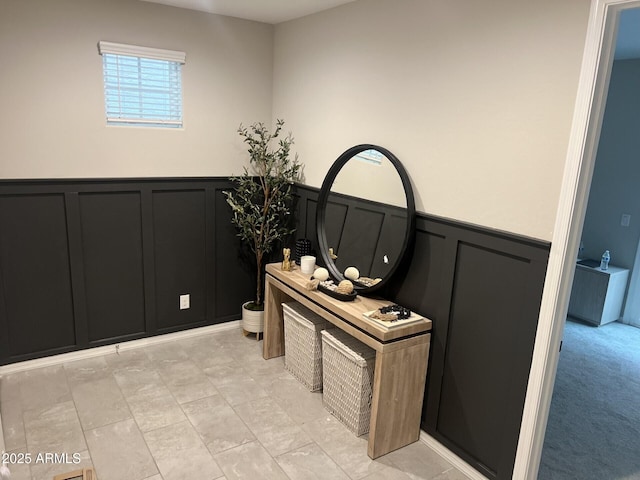 613 W Winchester Dr, Chandler, AZ 85286 - hall featuring a decorative wall and a wainscoted wall