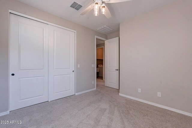 613 W Winchester Dr, Chandler, AZ 85286 - unfurnished bedroom featuring carpet floors, a closet, baseboards, and a ceiling fan
