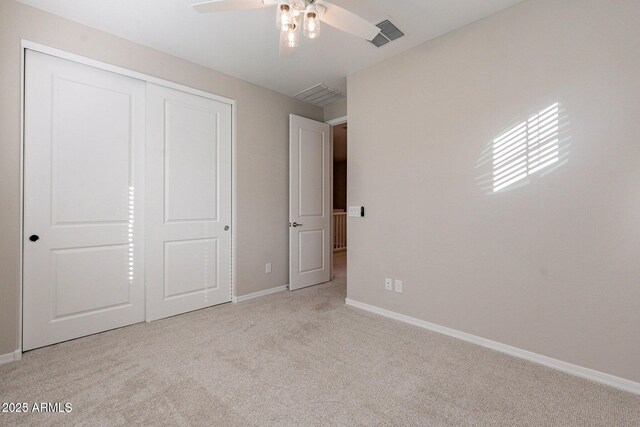 613 W Winchester Dr, Chandler, AZ 85286 - unfurnished bedroom featuring carpet flooring, baseboards, a closet, and ceiling fan