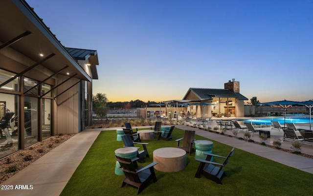 613 W Winchester Dr, Chandler, AZ 85286 - view of green lawn featuring a patio