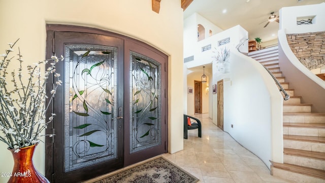 foyer with ceiling fan