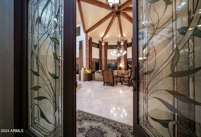 entryway featuring an inviting chandelier