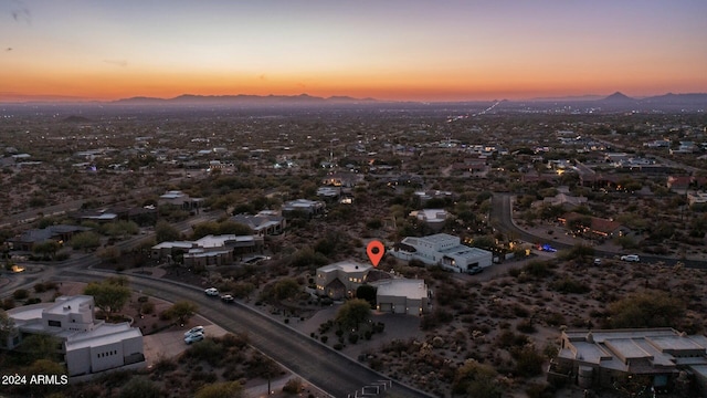 aerial view at dusk with a mountain view