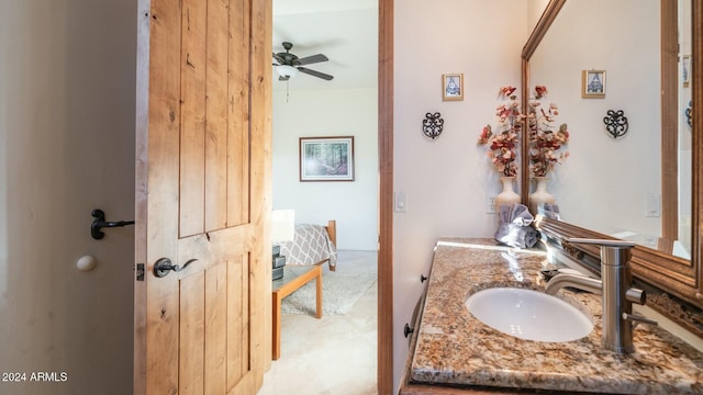 bathroom with vanity and ceiling fan