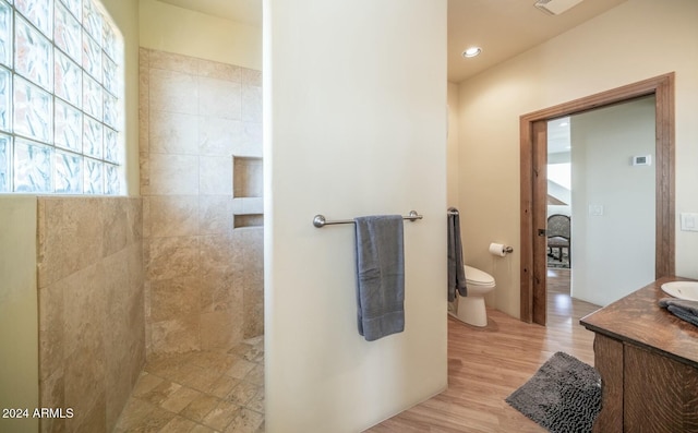 bathroom featuring hardwood / wood-style floors, vanity, and toilet