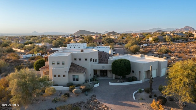 drone / aerial view featuring a mountain view