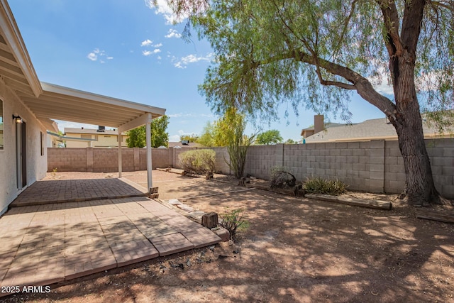 2318 N 87th Ave, Phoenix, AZ 85037 - fenced backyard featuring a patio