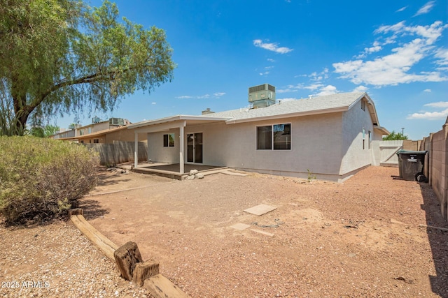 2318 N 87th Ave, Phoenix, AZ 85037 - rear view of property featuring a patio area and stucco siding