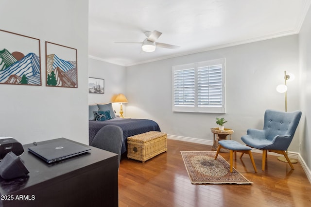 bedroom featuring crown molding, hardwood / wood-style floors, and ceiling fan