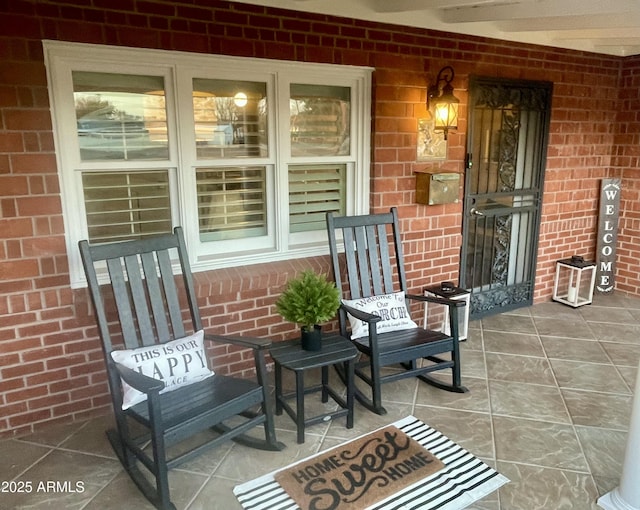 view of patio featuring covered porch