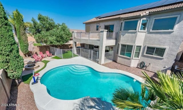 view of swimming pool featuring a patio area