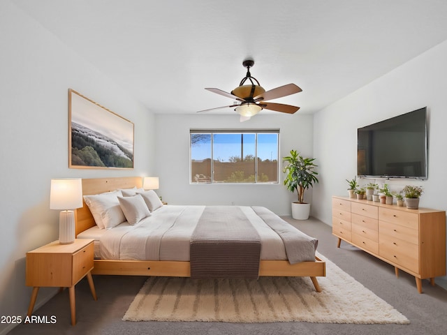 carpeted bedroom with a ceiling fan