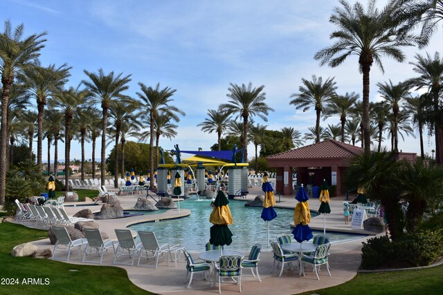 view of swimming pool with a patio area