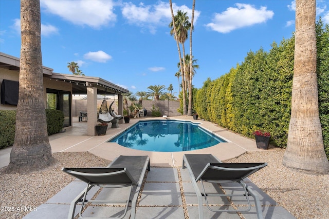 view of swimming pool with a gazebo and a patio