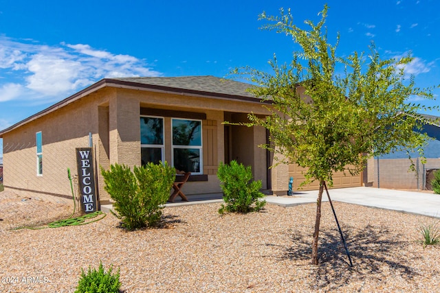 view of front of property featuring a garage