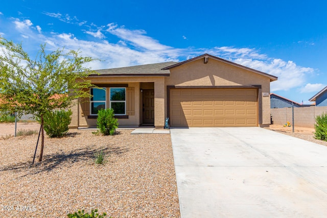 view of front of property featuring a garage