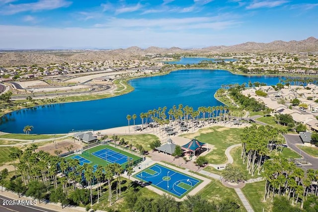 aerial view featuring a water and mountain view and a residential view