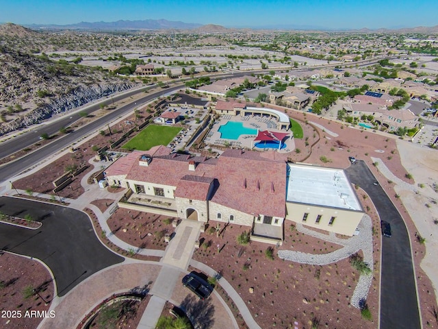 bird's eye view with a residential view and a mountain view