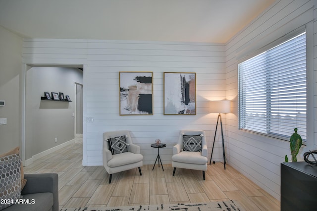 sitting room with light hardwood / wood-style flooring