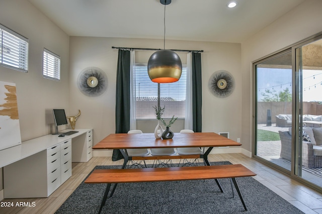 dining room with light wood-type flooring