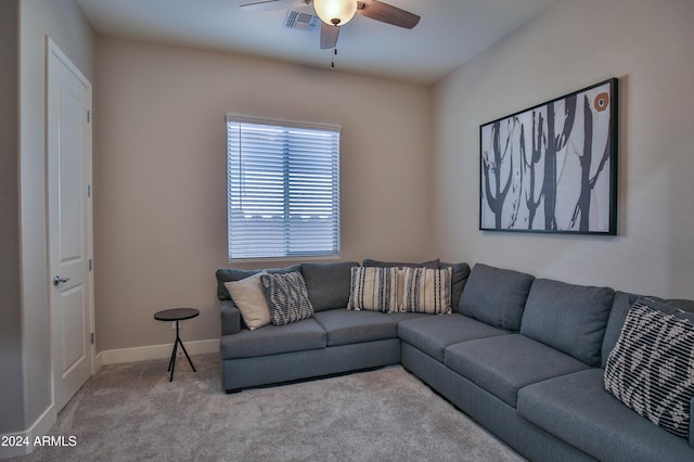 living room with ceiling fan and light carpet