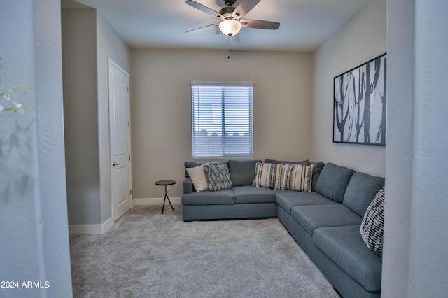 living room featuring ceiling fan and light carpet