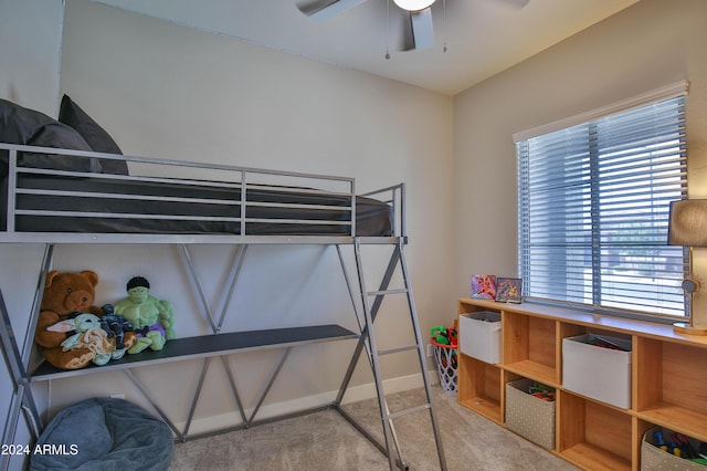 bedroom featuring ceiling fan and carpet floors