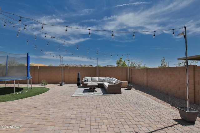 view of patio / terrace with outdoor lounge area and a trampoline