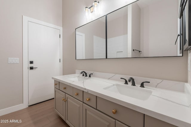1062 N Robin Ln, Mesa, AZ 85213 - full bath featuring double vanity, wood finished floors, and baseboards