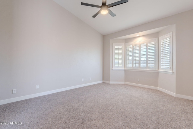 1062 N Robin Ln, Mesa, AZ 85213 - spare room featuring a ceiling fan, carpet flooring, vaulted ceiling, and baseboards